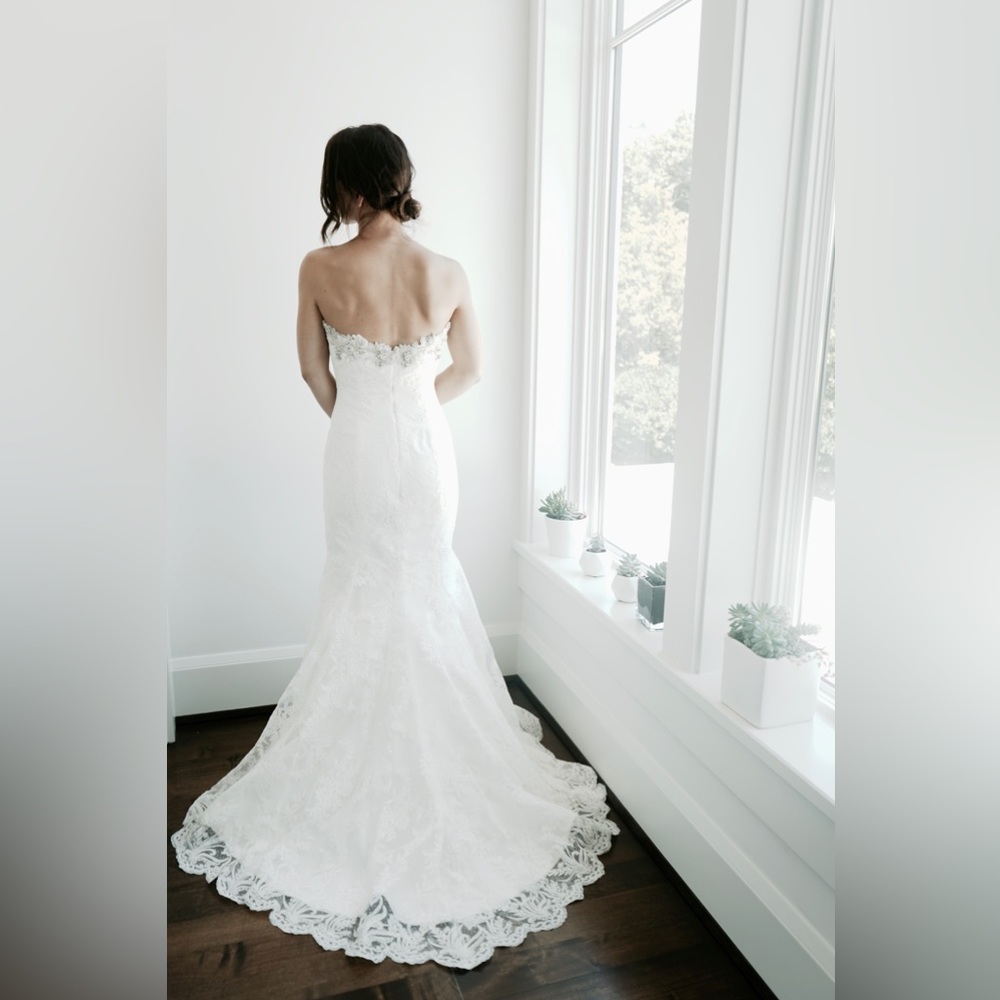 Romona Keveza wedding dress. Never worn or altered. Size 8